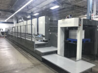 Used 2009 Komori LS840+CX Hybrid IR UV offset printing press available with Trinity Printing Machinery USA
