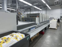 Used Komori LS640+CX six color coater offset press for sale with Trinity Printing Machinery USA